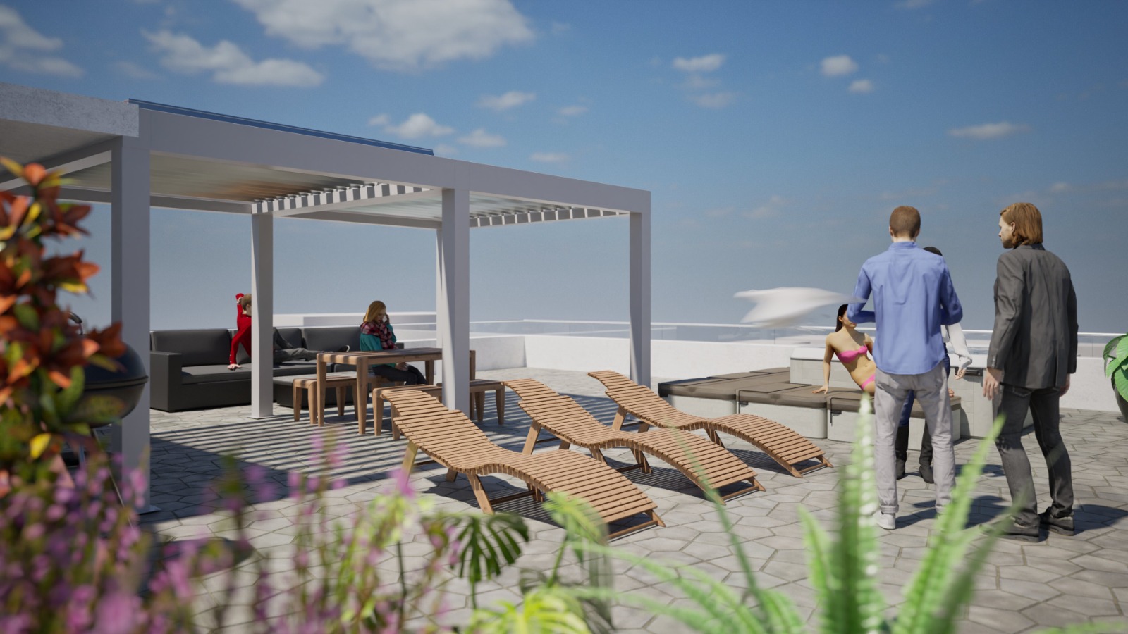 Zona lounge con divani e lettini sulla terrazza in copertura